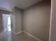 View of hallway and doorway to the bathroom at 6407 1St Palm Pt, St Pete Beach, FL 33706