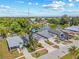 Waterfront single-Gathering home with mature trees and long driveway in a neighborhood setting at 6741 51St N Way, Pinellas Park, FL 33781