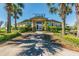 Exterior of the community center with well-maintained landscaping and clear signage at 7246 Bucks Ford Dr, Riverview, FL 33578