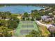 Aerial view showcasing community tennis courts, great for recreational play at 7246 Bucks Ford Dr, Riverview, FL 33578
