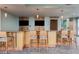Well-equipped bar area with seating, perfect for entertaining guests with its nice granite countertop at 777 N Ashley Dr # 1506, Tampa, FL 33602