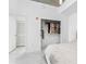 Bright bedroom featuring a minimalistic design, concrete ceilings, and walk-in closet at 777 N Ashley Dr # 1506, Tampa, FL 33602