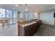 Relaxing kitchen area with ample seating, natural light, and views of the city at 777 N Ashley Dr # 1506, Tampa, FL 33602