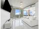 Bright living room with modern fixtures, a balcony, and a beautiful view of the city at 777 N Ashley Dr # 1506, Tampa, FL 33602