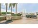 Outdoor kitchen featuring a gas grill, seating area, and lush landscaping, ideal for relaxing or entertaining at 777 N Ashley Dr # 1506, Tampa, FL 33602