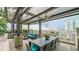 Spacious rooftop terrace with dining table, comfortable seating, and city views, perfect for outdoor gatherings at 777 N Ashley Dr # 1506, Tampa, FL 33602