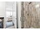 Bathroom boasts tiled shower with frameless glass doors and is conveniently located near the bedroom at 820 2Nd N Ave, St Petersburg, FL 33701