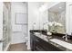 Sleek bathroom showcasing glass enclosed shower, dual sink vanity and modern tile at 820 2Nd N Ave, St Petersburg, FL 33701