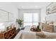 Bright bedroom featuring a comfortable bed with stylish decor and lots of natural light at 820 2Nd N Ave, St Petersburg, FL 33701