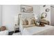 Comfortable bedroom with a queen bed, stylish decor, and lots of natural light at 820 2Nd N Ave, St Petersburg, FL 33701