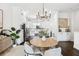 Open-concept kitchen and dining area offer seamless entertaining and stylish décor at 820 2Nd N Ave, St Petersburg, FL 33701