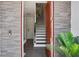 Welcoming entryway featuring a staircase and stylish tiled flooring at 820 2Nd N Ave, St Petersburg, FL 33701