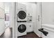 Convenient laundry area with modern washer, dryer, and storage cabinets at 820 2Nd N Ave, St Petersburg, FL 33701