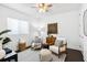 Bright living area features stylish decor, comfortable seating, and neutral color palette at 820 2Nd N Ave, St Petersburg, FL 33701