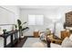 Comfortable living area features modern decor, natural light and open floor plan at 820 2Nd N Ave, St Petersburg, FL 33701
