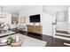 Living room with hardwood floors, stylish decor, and staircase at 820 2Nd N Ave, St Petersburg, FL 33701