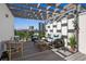 Relaxing roof deck with comfortable seating, pergola, city views, and stylish outdoor decor at 820 2Nd N Ave, St Petersburg, FL 33701