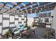 Spacious rooftop deck features a lounge area, comfortable seating, and a pergola for shade and relaxation at 820 2Nd N Ave, St Petersburg, FL 33701