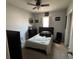 Relaxing bedroom featuring a ceiling fan, and comfortable bed at 821 Lucent Sands Ct, Brandon, FL 33511