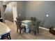 Dining room with a modern glass-top table and stylish upholstered chairs, perfect for entertaining at 821 Lucent Sands Ct, Brandon, FL 33511