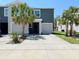 Modern two-story home with a two-car garage and well-maintained landscaping at 821 Lucent Sands Ct, Brandon, FL 33511