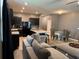 Open-concept living area with a kitchen, a dining space, and ample room for relaxation at 821 Lucent Sands Ct, Brandon, FL 33511