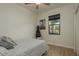 Bright bedroom with a cozy bed, natural light, and relaxing decor at 8523 N Newport Ave, Tampa, FL 33604