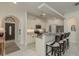 Bright kitchen features an island with seating and stainless steel appliances at 8523 N Newport Ave, Tampa, FL 33604