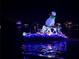 Night scene showing a festive boat parade with lights and a snowman on the water for waterfront celebrations at 861 180Th E Ave, Redington Shores, FL 33708