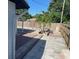 Private backyard featuring pavers and a small palm tree, ideal for outdoor entertaining and relaxation at 8665 55Th N St, Pinellas Park, FL 33782