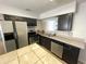 This kitchen features stainless steel appliances, ample cabinetry and a large island at 8665 55Th N St, Pinellas Park, FL 33782