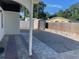 Spacious brick patio with a shed, offering ample room for outdoor activities and storage solutions at 8665 55Th N St, Pinellas Park, FL 33782