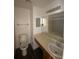 Bathroom featuring vanity with ample counter space and a toilet at 8708 Cobbler Pl, Tampa, FL 33615