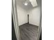 Cozy bedroom featuring modern floors, a fan, and closet at 8708 Cobbler Pl, Tampa, FL 33615
