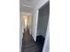 Hallway with an open closet at 8708 Cobbler Pl, Tampa, FL 33615