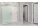 Bathroom featuring a glass shower at 8812 Parsons Hill Blvd, Wesley Chapel, FL 33545