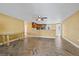 Bright living room boasts stylish herringbone floors, updated kitchen with a breakfast bar at 8918 Carmen Ln, Port Richey, FL 34668