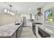 Updated kitchen showcasing a large island, stainless steel appliances, and sleek cabinetry at 94 Nicholas Dr, Dunedin, FL 34698