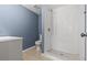 Bathroom features white tile shower and modern vanity sink at 9915 Aetna Ln, Port Richey, FL 34668