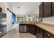 Spacious kitchen featuring stainless steel appliances and a sink overlooking a breakfast nook at 10197 Meadow Wren Ave, Weeki Wachee, FL 34613