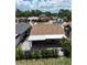 Overhead view of backyard featuring a covered patio ideal for outdoor gatherings and relaxation at 10325 Parkcrest Dr, Tampa, FL 33624