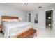 Serene bedroom with tiled floors, stylish decor, and ample natural light at 10325 Parkcrest Dr, Tampa, FL 33624