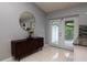 Dining area featuring modern cabinets, and a sliding door, bringing in light and style at 10325 Parkcrest Dr, Tampa, FL 33624
