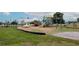 Community playground with a variety of play structures and slides for outdoor fun at 10325 Parkcrest Dr, Tampa, FL 33624