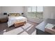 Bright bedroom with a large window, natural light, and carpeted flooring at 10464 Tranquil Meadow Loop, Riverview, FL 33569