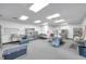 A large commercial kitchen offering lots of workspace and commercial grade stainless appliances at 10722 Sumner Rd, Wimauma, FL 33598