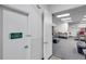 View of a commercial entryway with double doors, USDA signage, and tiled floors at 10722 Sumner Rd, Wimauma, FL 33598