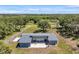 Gorgeous single-story home featuring expansive patio, and modern design, perfect for outdoor relaxation at 10722 Sumner Rd, Wimauma, FL 33598