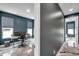 Spacious office with multiple windows and modern flooring, perfect for remote work at 10722 Sumner Rd, Wimauma, FL 33598