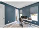 This home office space offers a functional layout with abundant natural light, perfect for a productive work environment at 10722 Sumner Rd, Wimauma, FL 33598